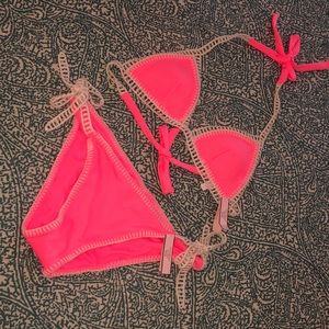 Two piece string bikini top w matching bottom.